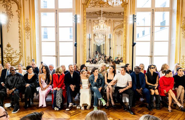 Victoria Beckham looks chic in Paris while David is mobbed by fans at his  pop-up store in the city