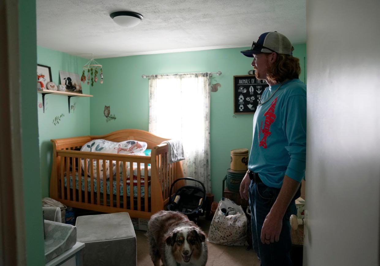 Justin Hayes of Newton Township lost his beloved wife, Nellie, and unborn daughter, Elleanor, at the end of March. On Tuesday, he shows off the nursery, which contains all the necessities and is decorated in a woodland animal theme.