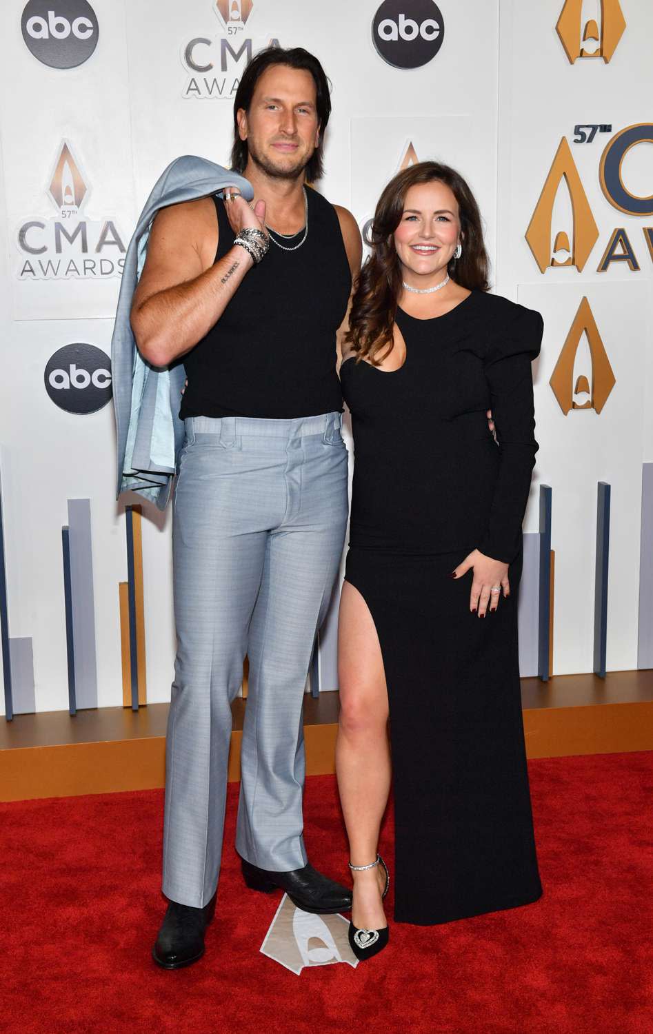 <p>Jason Davis/WireImage</p> Russell and Kailey Dickerson at the CMA Awards in Nashville on Nov. 8, 2023
