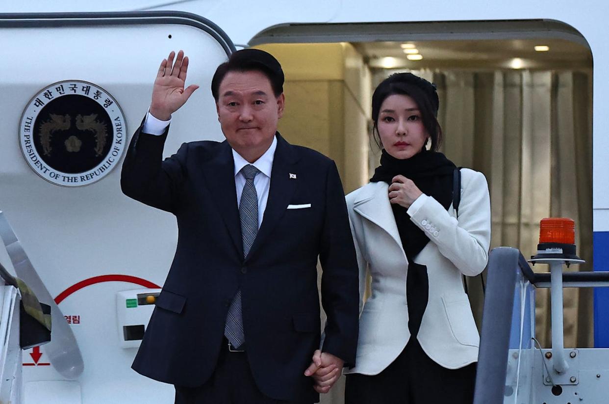 Is South Korean President Yoon Suk Yeol waving goodbye to his popularity? <a href="https://www.gettyimages.com/detail/news-photo/south-koreas-president-yoon-suk-yeol-and-his-wife-kim-keon-news-photo/1793664795?adppopup=true" rel="nofollow noopener" target="_blank" data-ylk="slk:Henry Nicholls/AFP via Getty Images;elm:context_link;itc:0;sec:content-canvas" class="link ">Henry Nicholls/AFP via Getty Images</a>