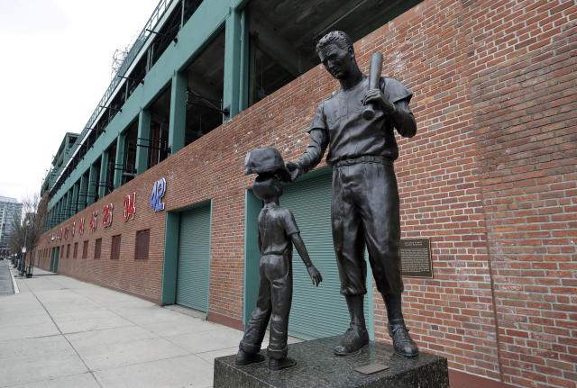 AP PHOTOS: Stadiums deserted as virus postpones opening day