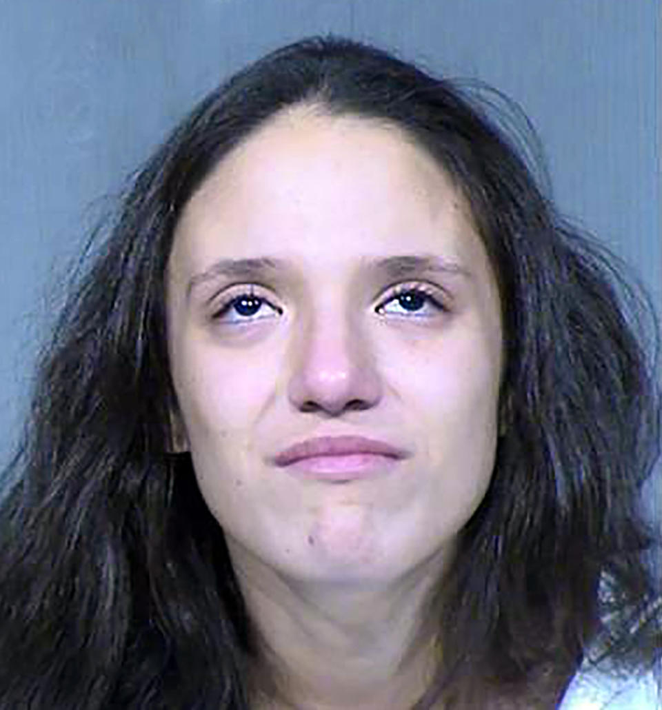 This Tuesday, Jan. 21, 2020 booking photo released by the Maricopa County Sheriff's Office, shows Rachel Henry, 22, who has been arrested on suspicion of killing her three children. They were found dead inside the family's home after firefighters got a call about a drowning authorities said Tuesday. (Maricopa County Sheriff's Office via AP)