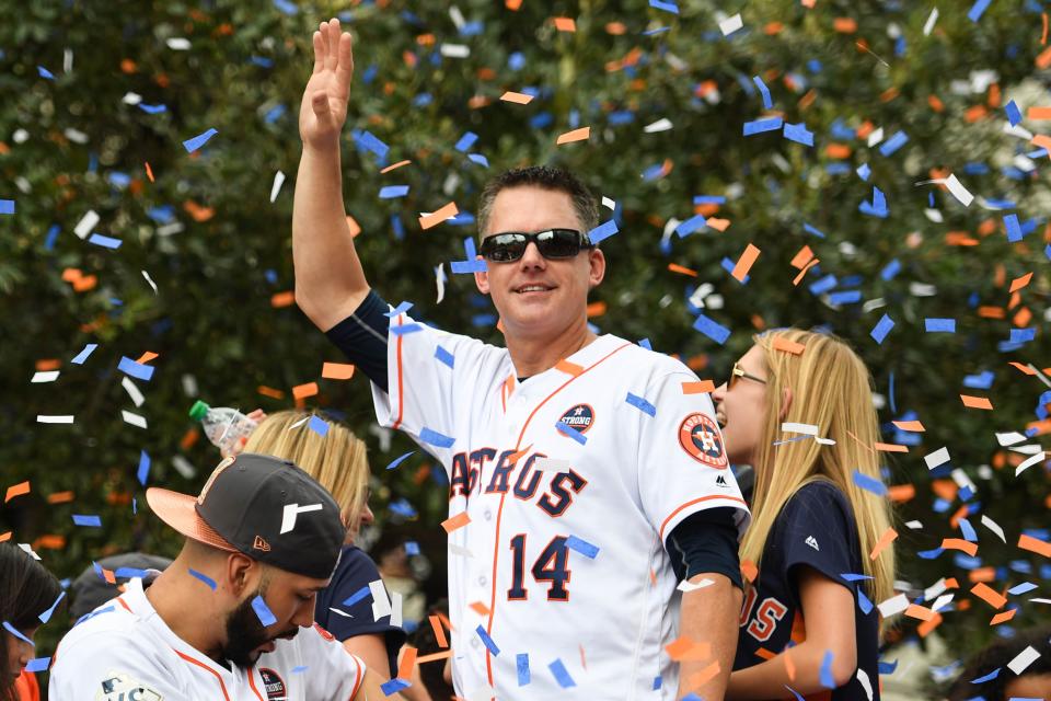 Houston Astros manager A.J. Hinch greets fans during the World Series championship parade and rally for the Houston Astros in downtown Houston, Nov. 3, 2017.