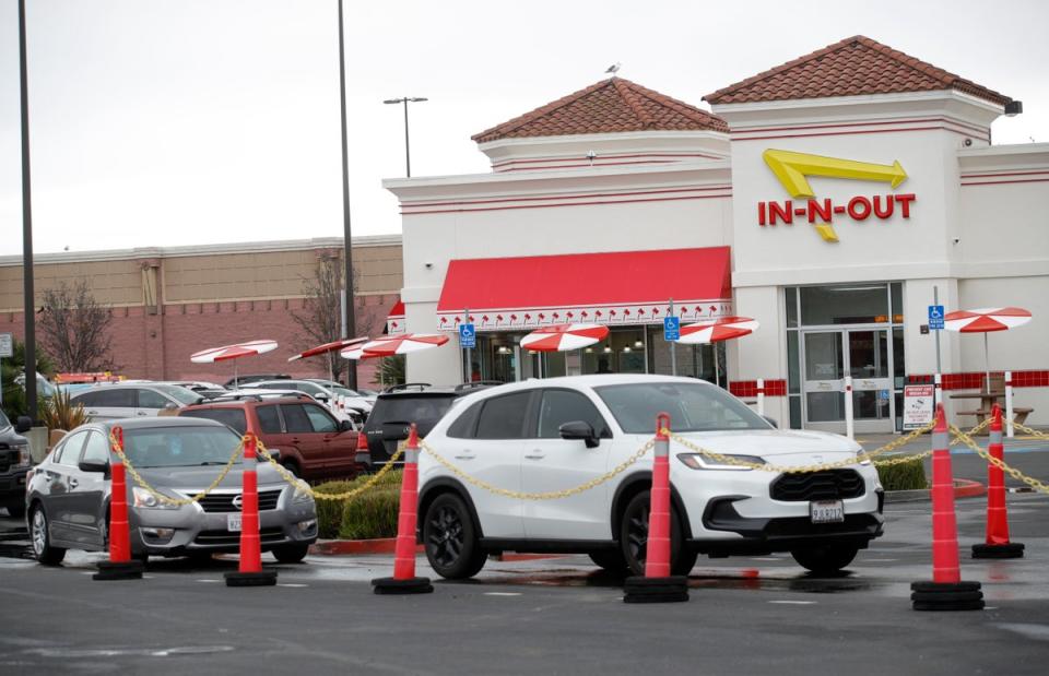 Americans are eating fast food less due to inflation-driven rising costs of meals paired with financial strain (stock image) (Bay Area News Group)