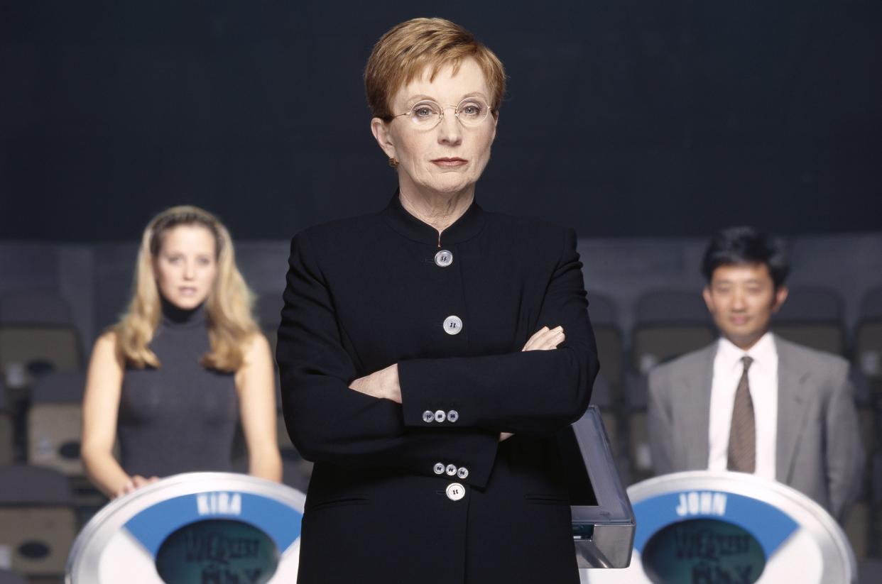 THE WEAKEST LINK -- Pictured: (foreground) Host Anne Robinson (background) unknown contestants -- Photo by: Chris Haston/NBCU Photo Bank