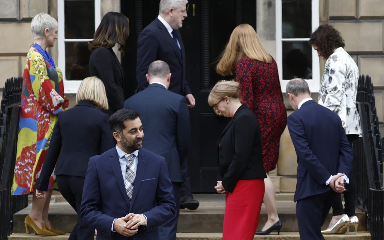 Humza Yousaf after posing for a photograph with his new Cabinet on the steps of Bute House on Wednesday - GETTY IMAGES