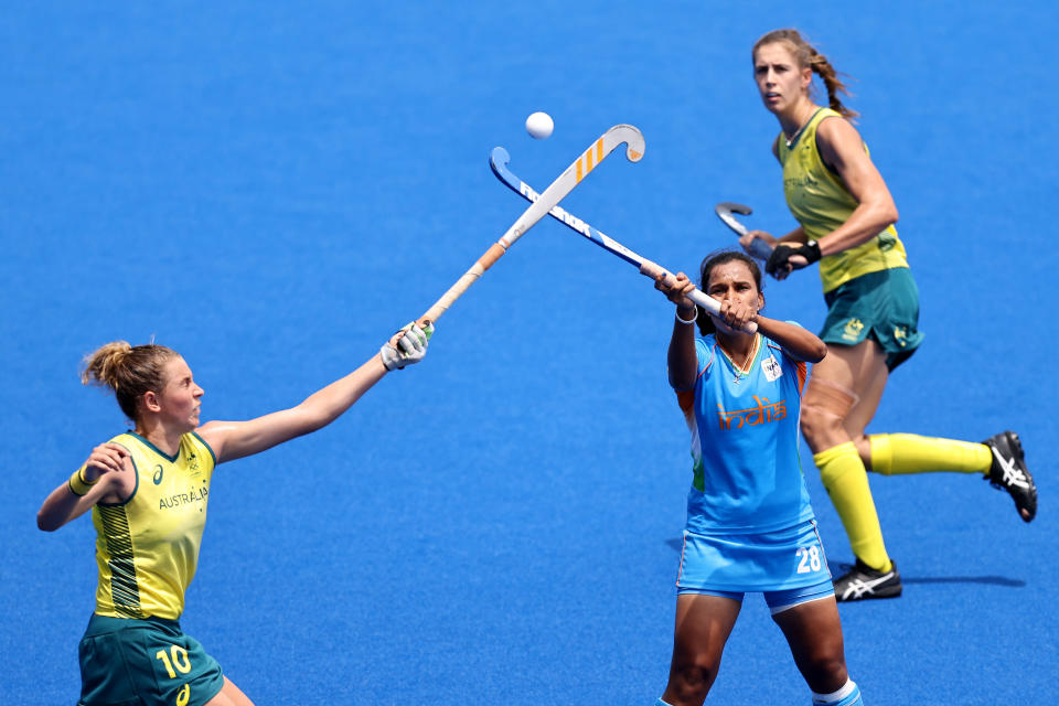 TOKYO, JAPAN - AUGUST 02: Madison Mae Fitzpatrick of Team Australia and Rani of Team India battle for a loose ball during the Women's Quarterfinal match between Australia and India on day ten of the Tokyo 2020 Olympic Games at Oi Hockey Stadium on August 02, 2021 in Tokyo, Japan. (Photo by Buda Mendes/Getty Images)