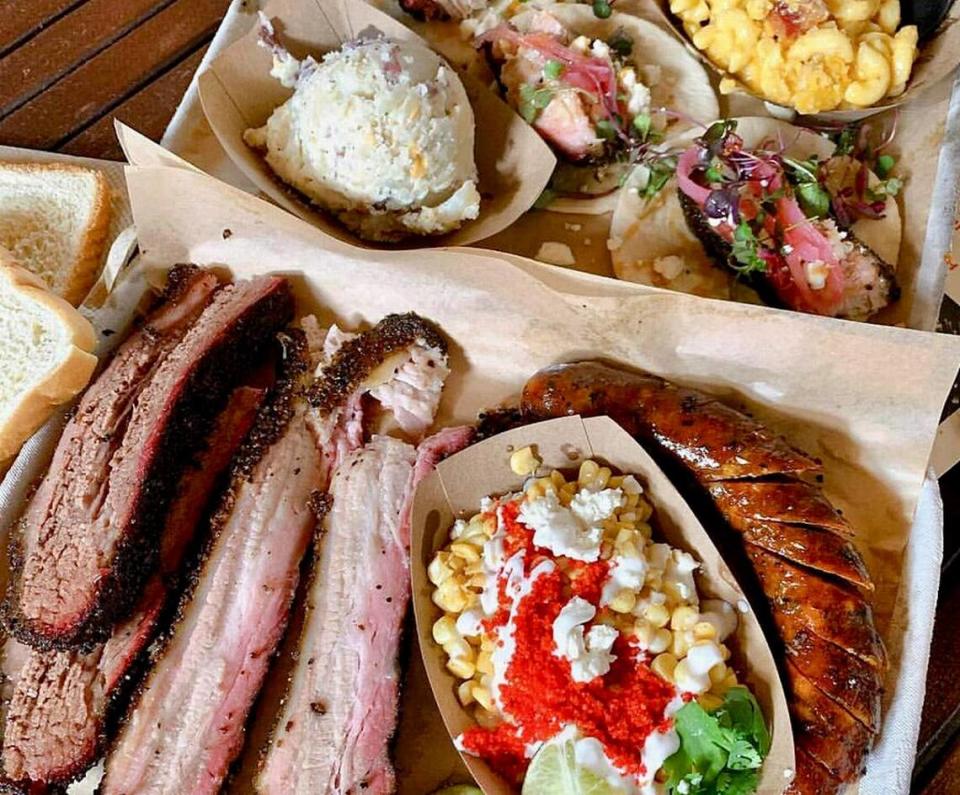 A Dayne’s barbecue platter with a smoked pork belly taco.