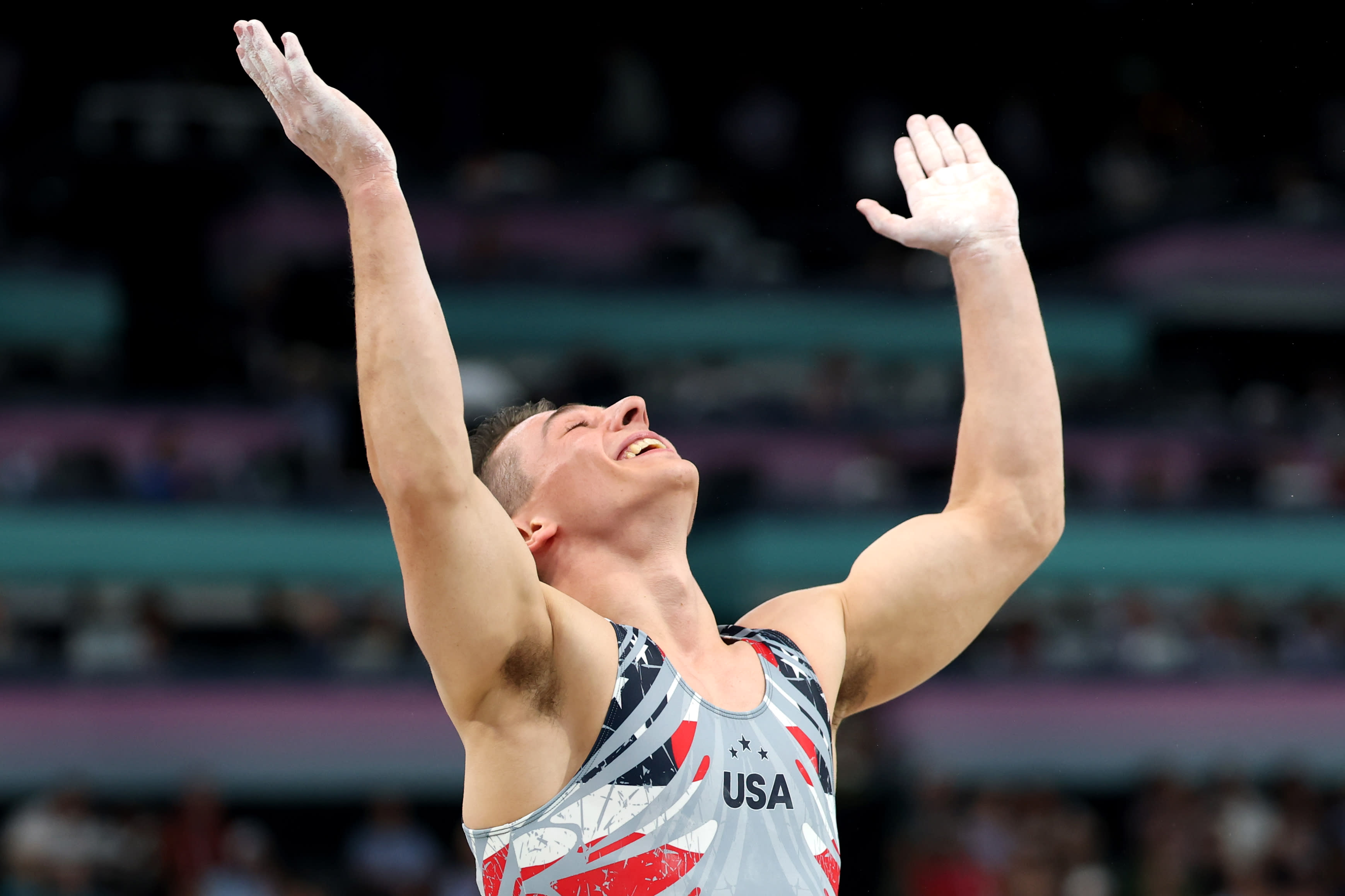 PARIS, FRANCE - JULY 29: Paul Juda of Team United States celebrates after his routine on the vault during the Artistic Gymnastics Men's Team Final on day three of the Olympic Games Paris 2024 at Bercy Arena on July 29, 2024 in Paris, France. (Photo by Naomi Baker/Getty Images)