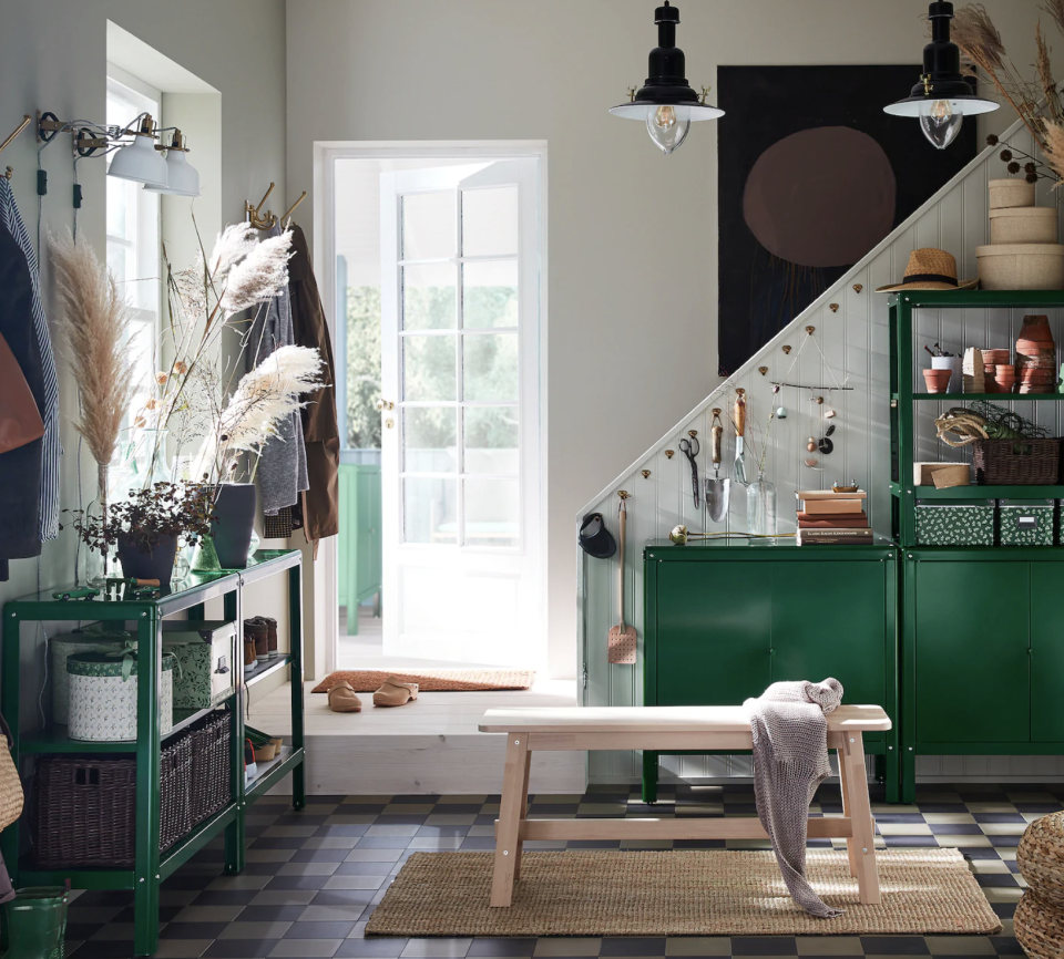 Give an all-white hallway personality with colorful furniture