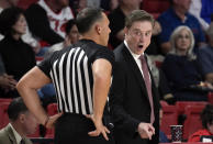 St. John's head coach Rick Pitino talks with a referee during the first half of an NCAA college basketball game against Stony Brook, Tuesday, Nov. 7, 2023, in New York. (AP Photo/Seth Wenig)