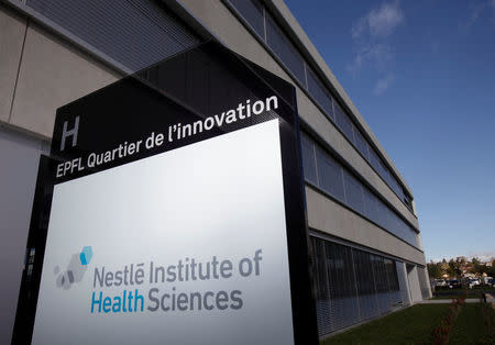 A logo is pictured outside the Nestle Institute of Health Sciences in Lausanne, Switzeralnd, November 2, 2012. REUTERS/Denis Balibouse/File Photo