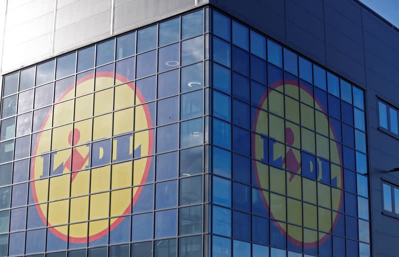 FILE PHOTO: Lidl's logos are seen on the exterior of its new Scottish distribution centre as it commences operations in Motherwell, Scotland