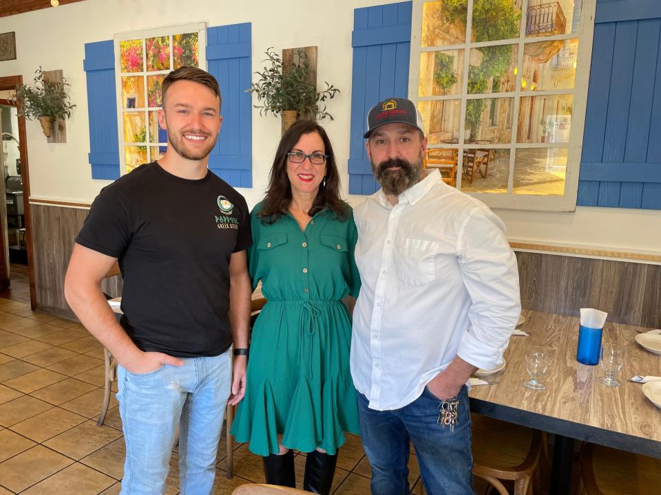Lohud Food & Dining Reporter Jeanne Muchnick in Yorktown Heights with Pappous Greek Kitchen Owners Rui Cunha, on right, and his oldest son, Andrew. Photographed Oct. 26, 2023