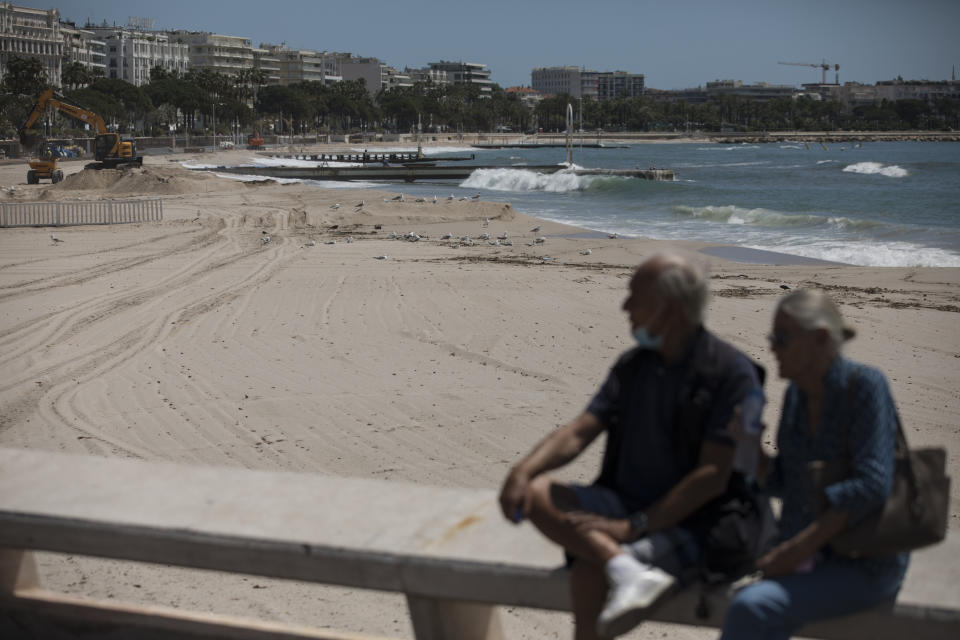 The deserted Croisette beach is pictured empty due to measures put in place to stop the spread of the coronavirus in Cannes, southern France, Tuesday, May 12, 2020. The Cannes Film Festival won't kick off as planned on Tuesday. The festival's 73rd edition has been postponed indefinitely, part of the worldwide shutdowns meant to stop the spread of the coronavirus. (AP Photo/Daniel Cole)