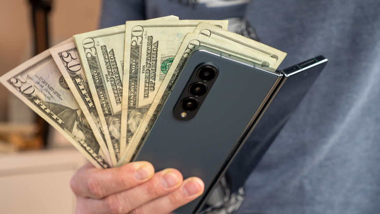  A Samsung Galaxy Z Fold 4 with US dollars 