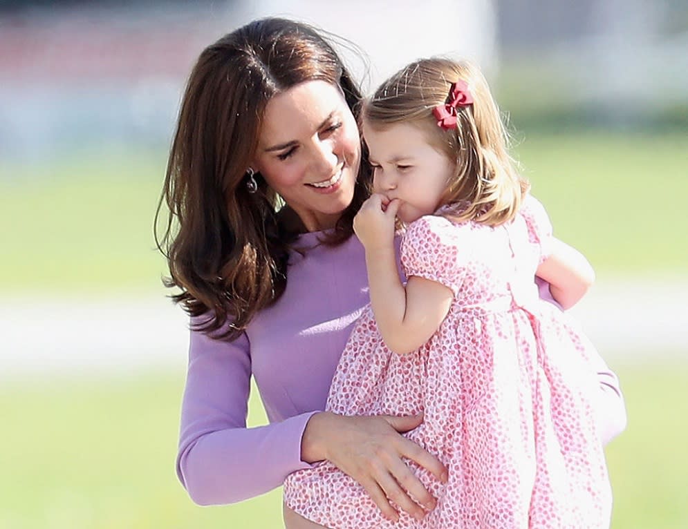 The queen revealed that Princess Charlotte likes to boss Prince George around