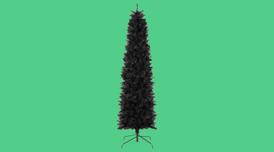 Lean into your dark side with a black artificial Christmas tree this holiday season.