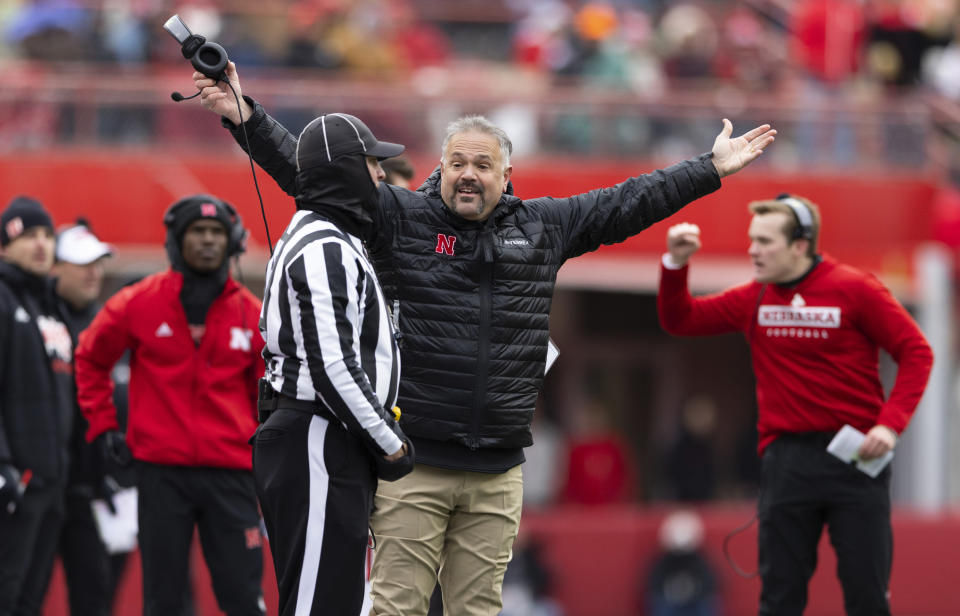 Nebraska head coach Matt Rhule, center, argues in favor of a personal foul call against Iowa during the second half of an NCAA college football game Friday, Nov. 24, 2023, in Lincoln, Neb. (AP Photo/Rebecca S. Gratz)
