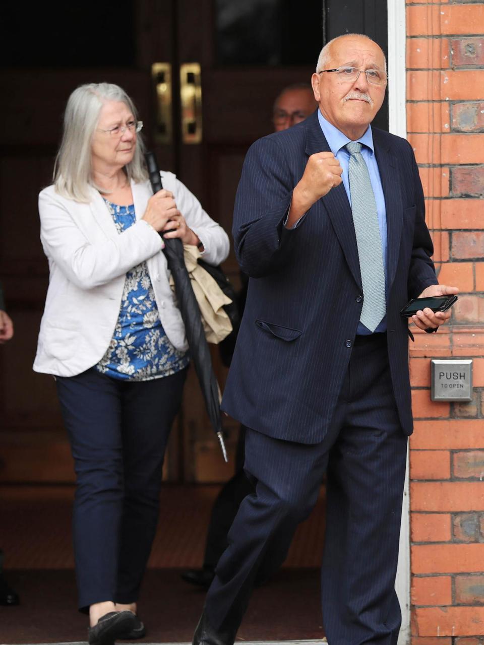 Barry Devonside leaves Parr Hall, Warrington, where the Crown Prosecution Service announced the charges (PA)