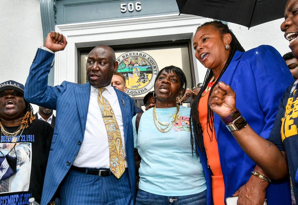 Attorney Benjamin Crump stands on the steps of the historic Titusville Courthouse with Linda Lowery-Johnson and attorney Natalie Jackson during a press conference Friday, June 3, 2022.  Lowery-Johnson is the mother of James Lowery, who was shot and killed during an incident involving Titusville police in December 2021.  Craig Bailey/FLORIDA TODAY via USA TODAY NETWORK
