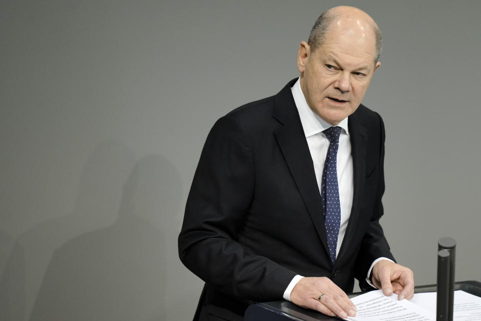 German Chancellor Olaf Scholz delivers a speech about Germany's budget crisis at the parliament Bundestag in Berlin, Germany, Tuesday, Nov. 28, 2023. With its economy already struggling, Germany now is wrestling to find a way out of a budget crisis after a court struck down billions in funding for clean energy projects and help for people facing high energy bills because of Russia's war in Ukraine. (AP Photo/Markus Schreiber)