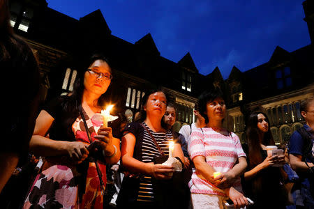 People attend a vigil for Xiyue Wang at Princeton University in Princeton, New Jersey, U.S. September 15, 2017. REUTERS/Eduardo Munoz/Files