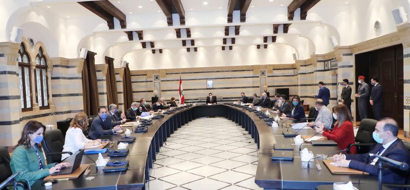 Lebanon's Prime Minister Hassan Diab heads a ministerial council meeting in Beirut