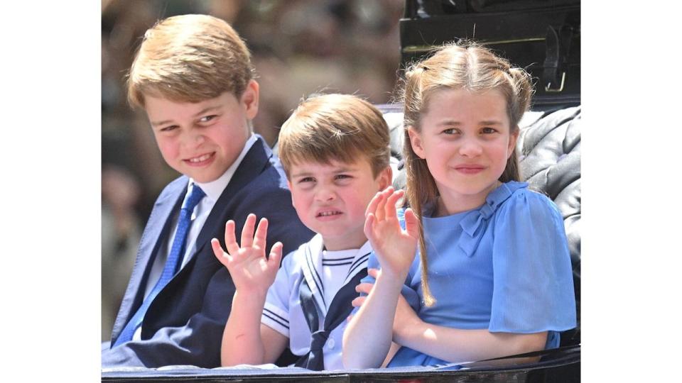 Prince George of Cambridge, Prince Louis of Cambridge and Princess Charlotte of Cambridge ride in a carriage during Trooping The Colour