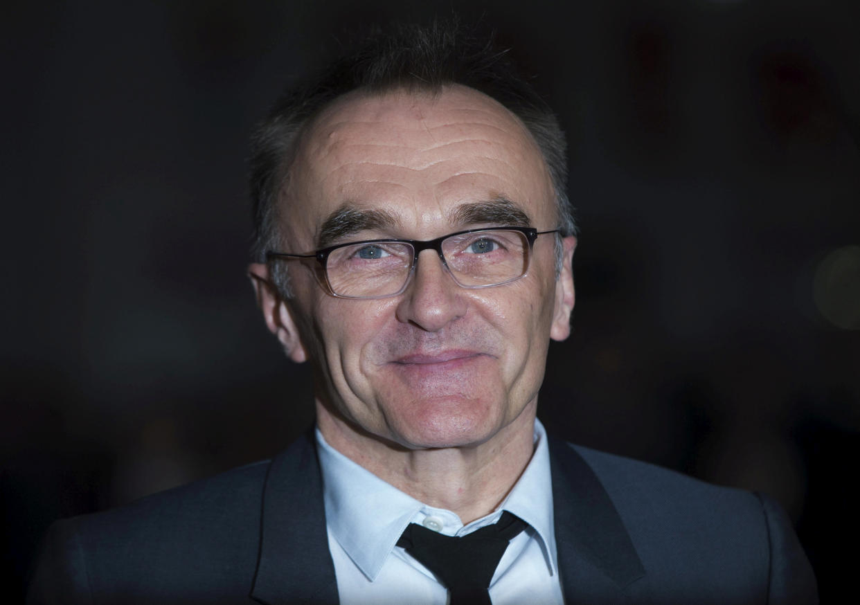 FILE PHOTO: Director Danny Boyle poses for photographers at the closing night premiere of the film “Steve Jobs” at the BFI London Film Festival October 18, 2015. REUTERS/Neil Hall/File Photo