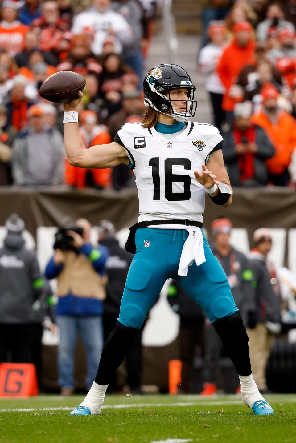 Jacksonville Jaguars quarterback Trevor Lawrence (16) throws a pass during an NFL football game against the Cleveland Browns, Sunday, Dec. 10, 2023, in Cleveland. (AP Photo/Kirk Irwin)