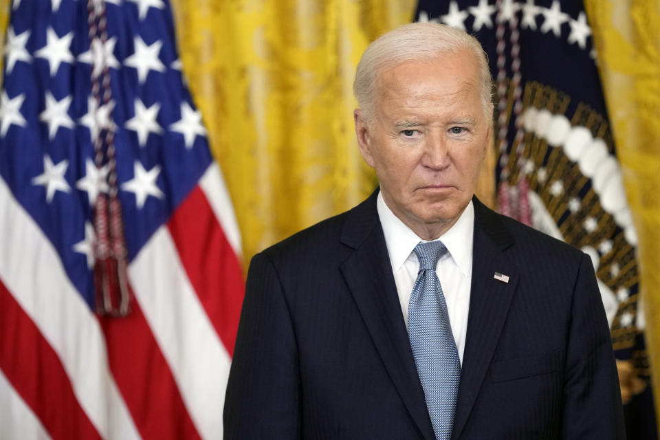 President Joe Biden listens during a Medal of Honor ceremony at the White House in Washington, Wednesday, July 3, 2024, posthumously honoring two U.S. Army privates who were part of a daring Union Army contingent that stole a Confederate train during the Civil War. U.S. Army Pvts. Philip G. Shadrach and George D. Wilson were captured by Confederates and executed by hanging. (AP Photo/Susan Walsh)