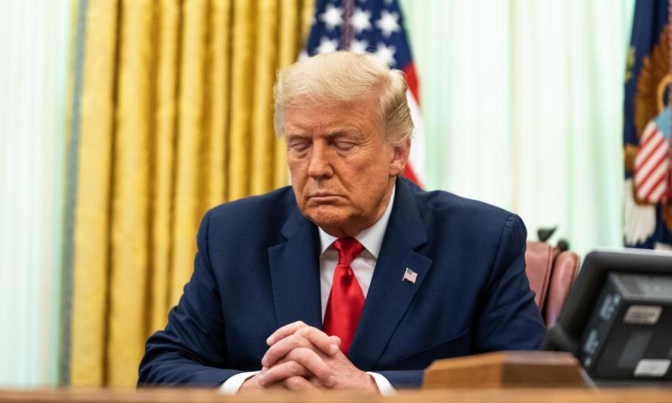 Donald Trump at a prayer meeting in the White House in August.