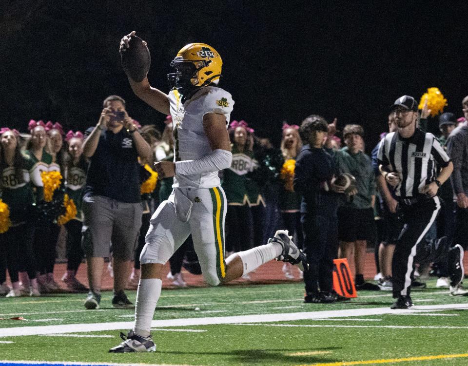 Red Bank Catholic Frankie Williams takes the ball to the right for his team’s second score of the game. Red Bank Catholic Football defeated Donovan Catholic 14-7 in Toms River, NJ on October 27, 2023.