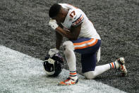 Chicago Bears wide receiver Anthony Miller (17) prays after an NFL football game against the Atlanta Falcons, Sunday, Sept. 27, 2020, in Atlanta. The Chicago Bears won 30-26. The entire Chicago Bears team had the initials of former player Gayle Sayers on their jerseys. (AP Photo/Brynn Anderson