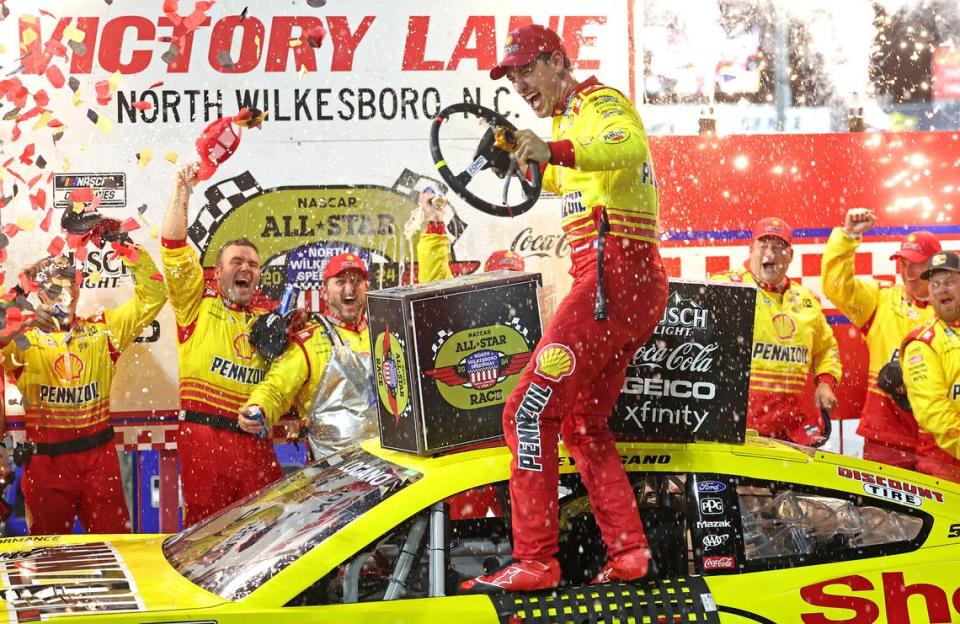 NASCAR Cup Series driver Joey Logano and his team celebrate winning the NASCAR All-Star race at North Wilkesboro Speedway in North Wilkesboro, NC on Sunday, May 19, 2024.