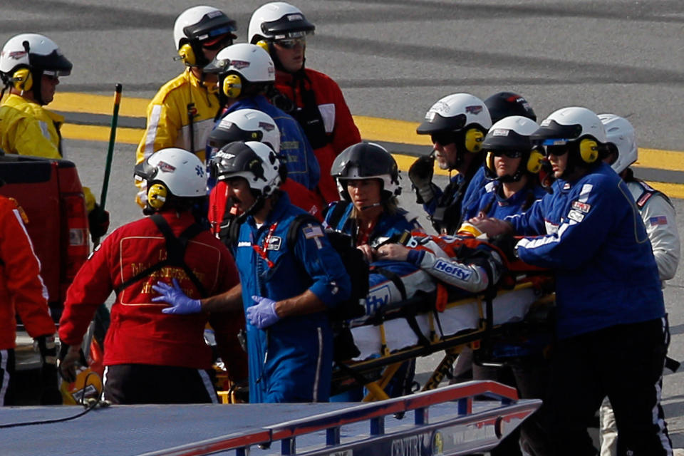 TALLADEGA, AL - MAY 05: Eric McClure, driver of the #14 Hefty/Reynolds Wrap Toyota, receives attention from a medical team after an incident during the NASCAR Nationwide Series Aaron's 312 at Talladega Superspeedway on May 5, 2012 in Talladega, Alabama. (Photo by Chris Graythen/Getty Images for NASCAR)