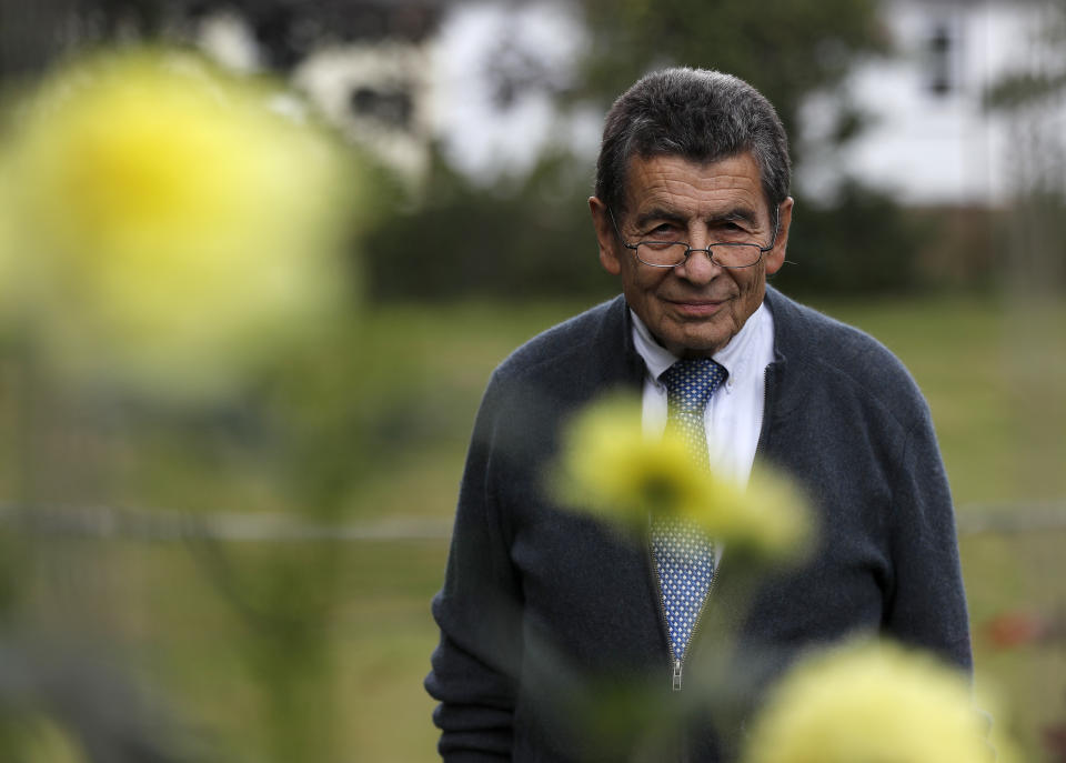 Human rights lawyer Geoffrey Nice walks through his garden at his home in Adisham, England, Wednesday, Sept. 2, 2020. The prominent British human rights lawyer is convening an independent tribunal in London with public hearings next year, to look into the Chinese government's alleged rights abuses against the Uighur Muslim minority in the far western province of Xinjiang.(AP Photo/Frank Augstein)