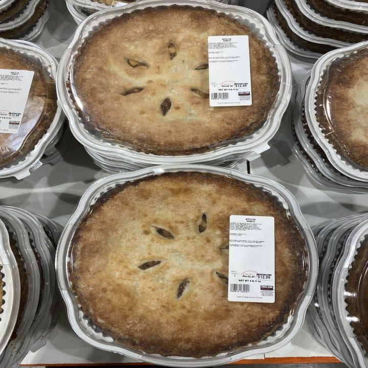 stacks of double-crusted apple pies