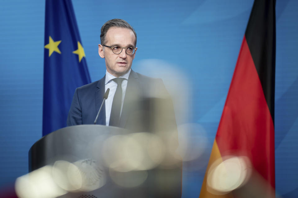 Heiko Maas, German Foreign Minister, gives a press conference on the informal virtual meeting on the informal virtual meeting of the foreign ministers of the member states of the Vienna nuclear agreement in Berlin, Germany, Monday, Dec. 21, 2020. (Kay Nietfeld/dpa via AP)