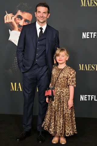 <p>Axelle/Bauer-Griffin/FilmMagic</p> Bradley Cooper and daughter Lea De Seine at the Los Angeles premiere of <em>Maestro</em> on Dec. 12, 2023