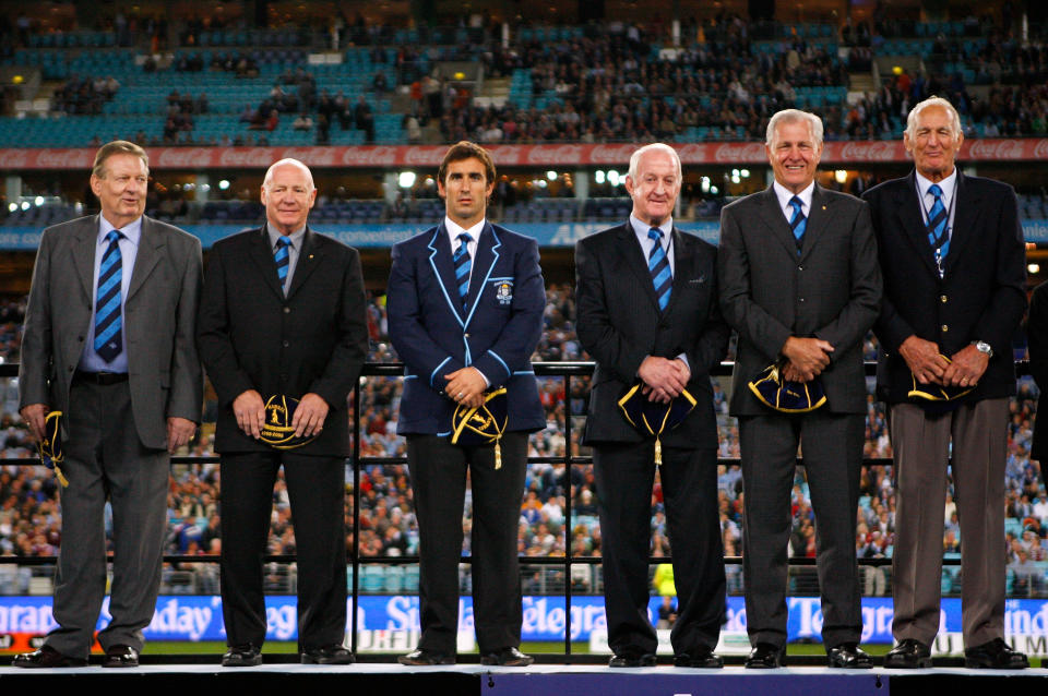 Bob Fulton (pictured second left) on stage after being inducted into the NSW Team of the Century before match one of the State of Origin series in 2008.