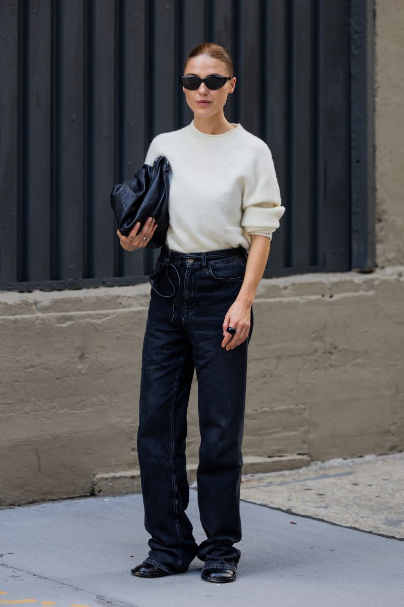 <p> Minimalists will love this fuss-free look. Add an extra dose of luxury and opt for a cashmere sweater and tuck it into your jeans to highlight your waist. The black jeans and matching bag and sunnies keep it pared-back and timeless. </p>