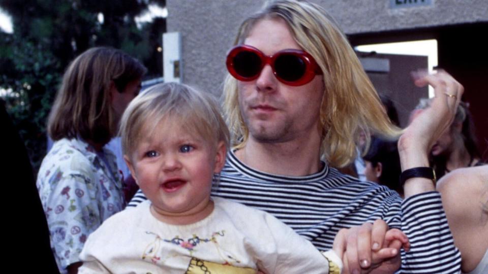 PHOTO: Kurt Cobain of Nirvana with wife Courtney Love and daughter Frances Bean Cobain, Sept. 2, 1993, at the MTV Video Music Awards. (Kevin Mazur/WireImage/Getty Images)