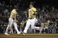 Arizona Diamondbacks' Daulton Varsho (12) scores a run on a ball hit by Asdrubal Cabrera in the tenth inning against the Los Angeles Dodgers during a baseball game, Friday, July 30, 2021, in Phoenix. Arizona won 6-5. (AP Photo/Rick Scuteri)