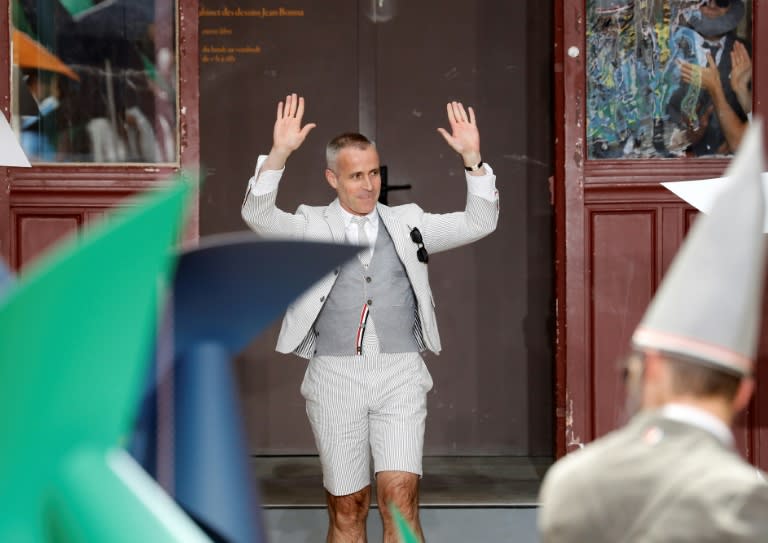 Thom Browne, seen here in Paris last year, is one of the designers who have moved their shows to avoid the 'Yellow vest' protests on Saturday acknowledges the audience at the end of the Men's Spring/Summer 2019 fashion show on June 23, 2018 in Paris