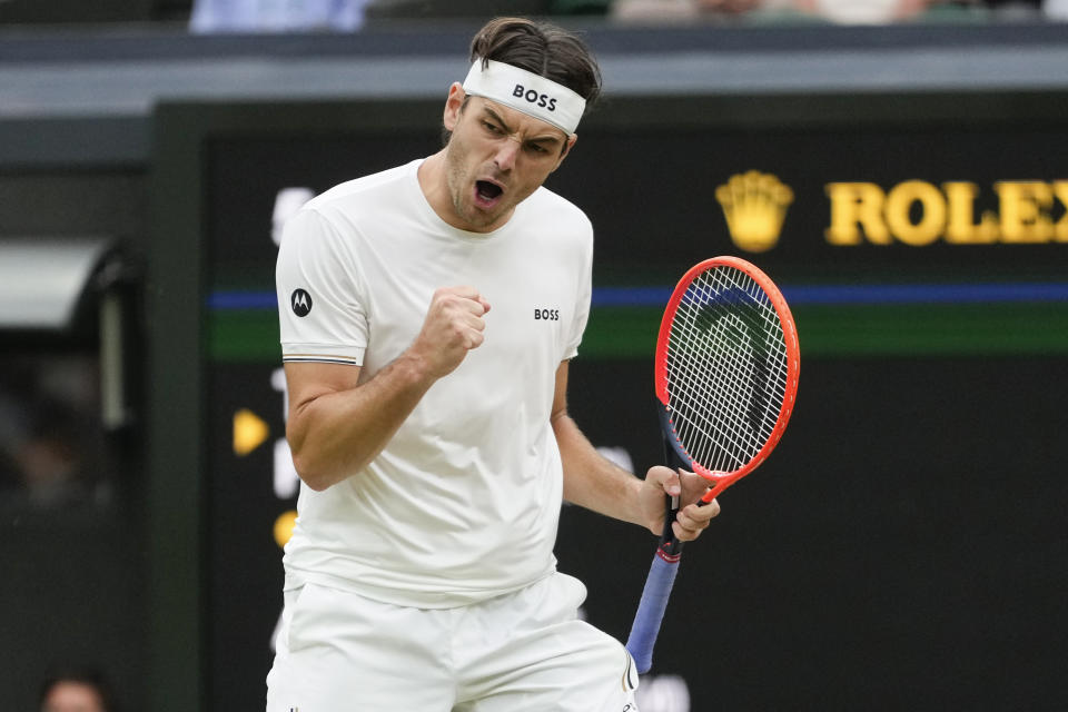 Taylor Fritz of the United States reacts during his fourth round match against Alexander Zverev of Germany at the Wimbledon tennis championships in London, Monday, July 8, 2024. (AP Photo/Kirsty Wigglesworth)