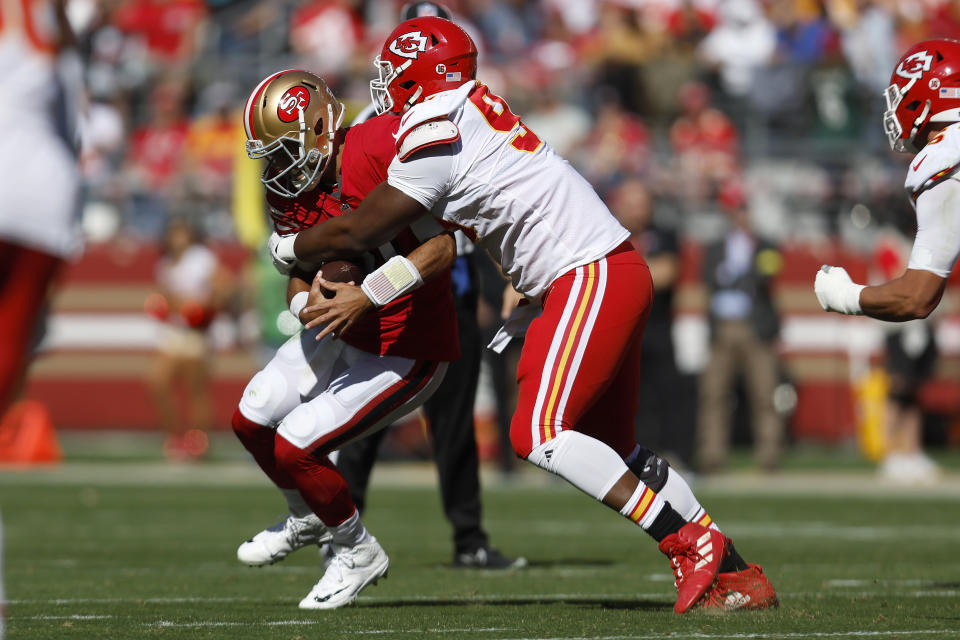 Kansas City Chiefs defensive tackle Chris Jones, right, sacks San Francisco 49ers quarterback Jimmy Garoppolo during the first half of an NFL football game in Santa Clara, Calif., Sunday, Oct. 23, 2022. (AP Photo/Jed Jacobsohn)