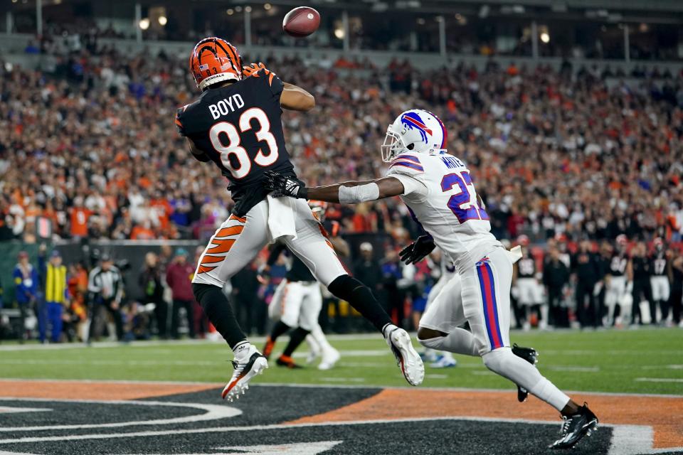 Bengals wide receiver Tyler Boyd catches a touchdown pass in front of Bills cornerback Tre'Davious White during the first quarter of their game on Jan. 2.