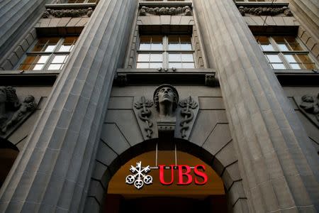 FILE PHOTO: The logo of Swiss bank UBS is seen at the company's headquarters in Zurich, February 10, 2015. REUTERS/Arnd Wiegmann/File Photo